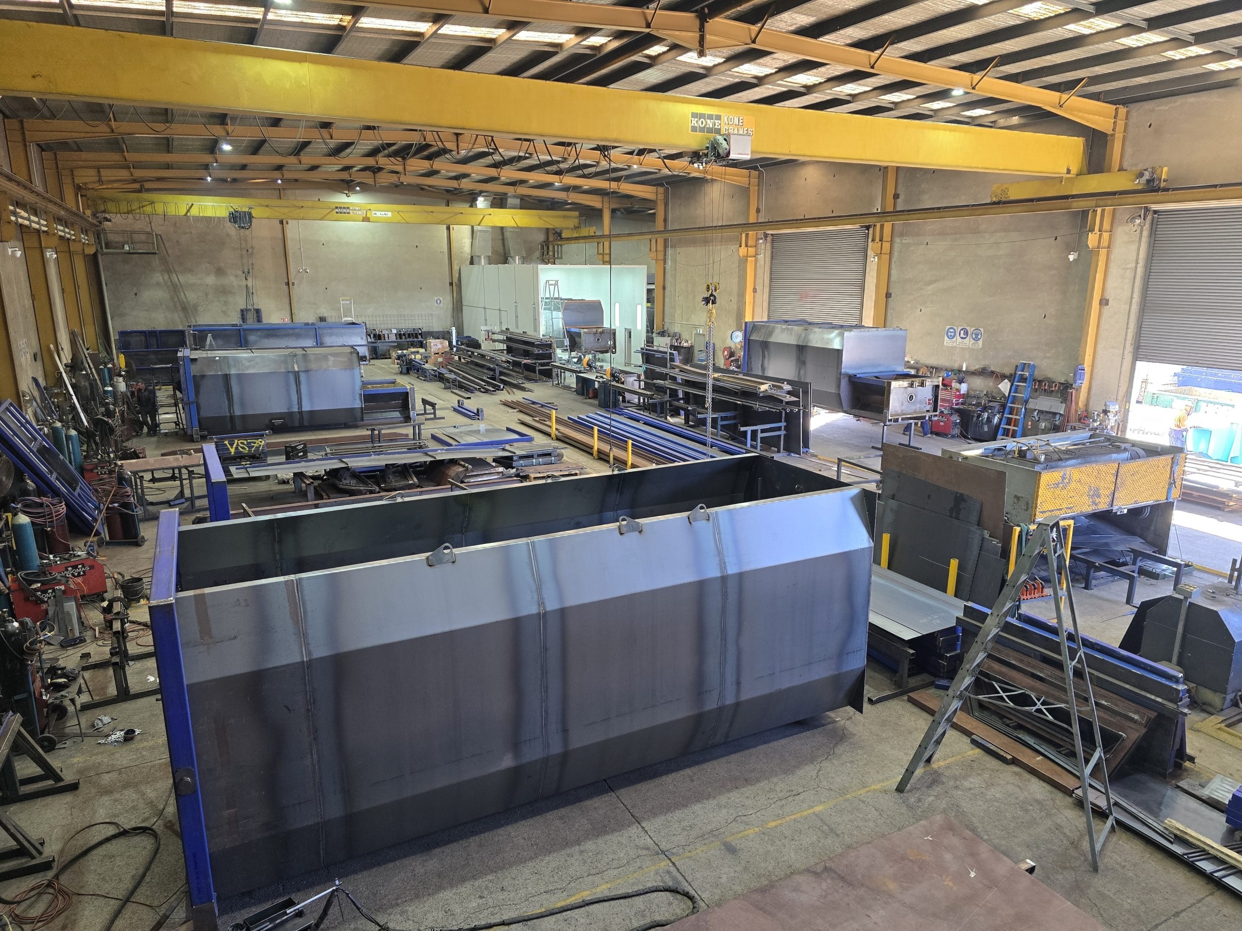 A finished Bincorp hook lift bin with tarping system